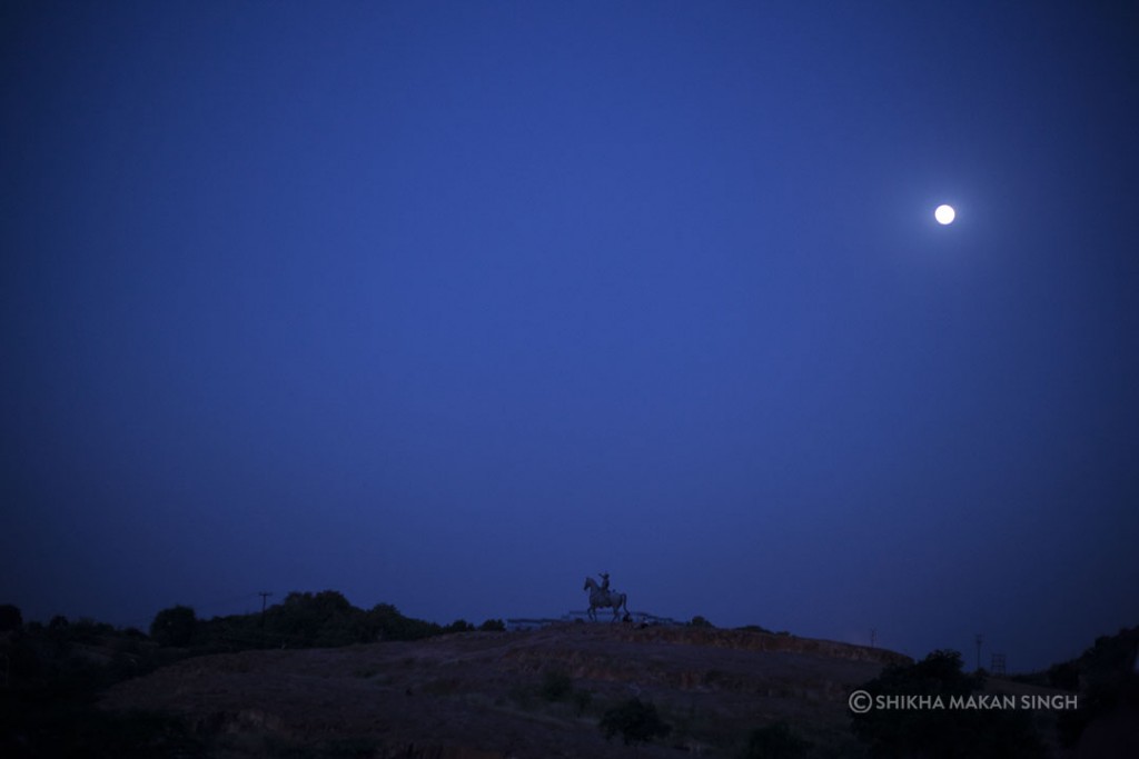 The statue of lone Rajput warrior under the full moon, makes you travel back in time.