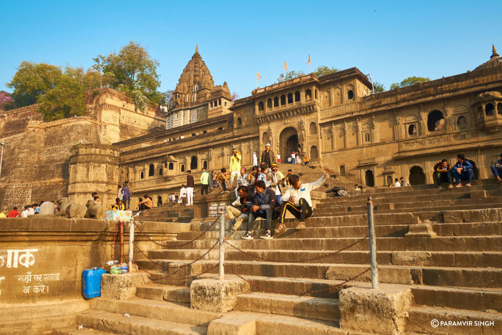 Youth taking selfies on Maheshwar Ghats